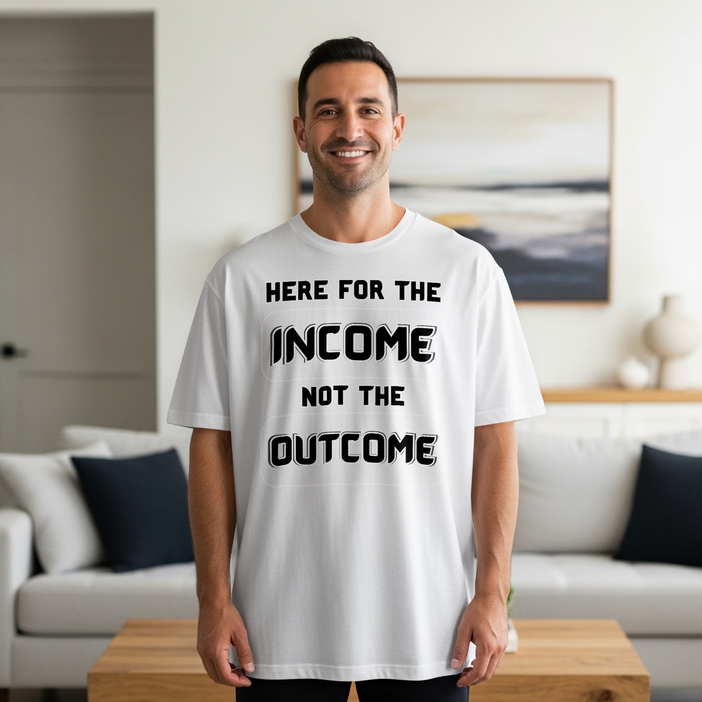 White t-shirt with text: "HERE FOR THE INCOME NOT THE OUTCOME".