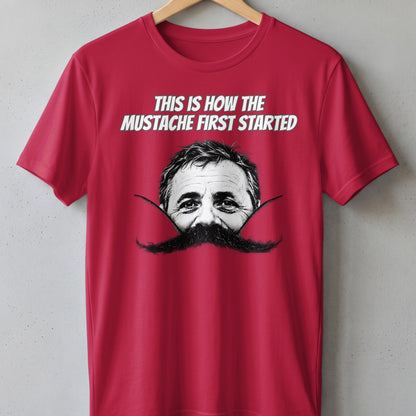 Red t-shirt with text and man's face peeking over a mustache.