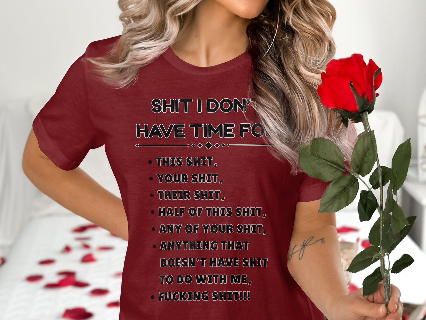 Red t-shirt with "Shit I don't have time for" list printed on it.