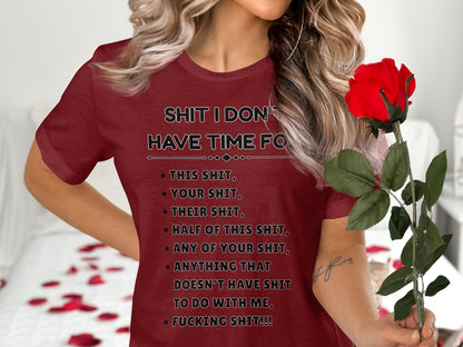 Red t-shirt with "Shit I don't have time for" list printed on it.
