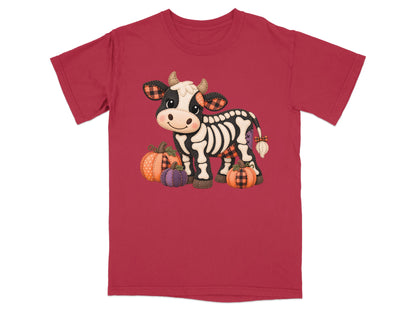 Skeleton cow with pumpkins on a red t-shirt.