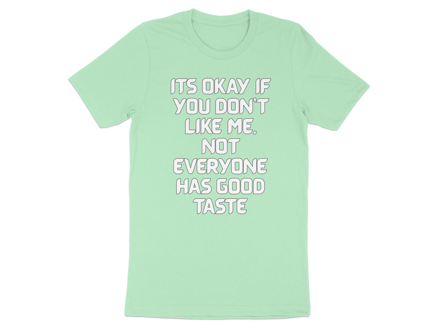 Mint t-shirt with white text "ITS OKAY IF YOU DON'T LIKE ME. NOT EVERYONE HAS GOOD TASTE."