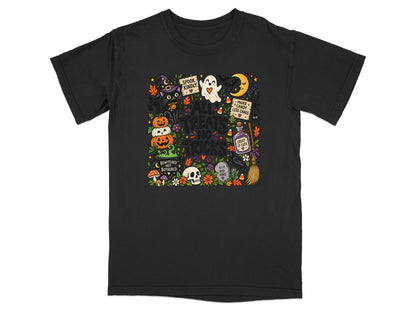 Black t-shirt with Halloween graphic featuring pumpkins, cat, ghost, moon, and text.