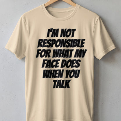 Light beige t-shirt with black text reading "I'm not responsible for what my face does when you talk."