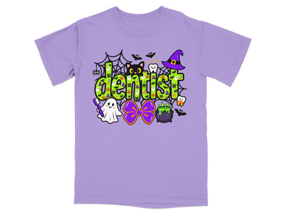 Light purple t-shirt featuring a green polka-dot "Dentist" graphic surrounded by Halloween elements.
