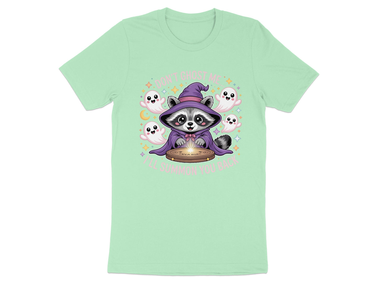 Raccoon in witch hat surrounded by ghosts and text "Don't ghost me I'll summon you back."