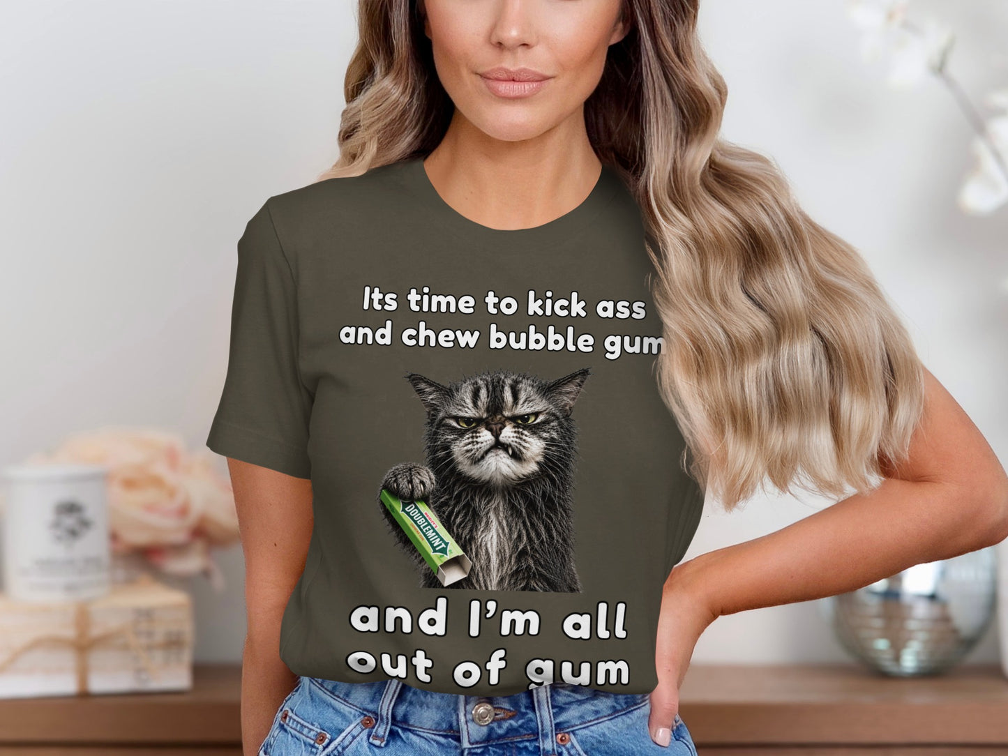 Grumpy cat with Doublemint gum holding sign "and I'm all out of gum".