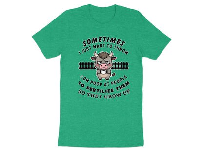 Green t-shirt with a grumpy cow graphic and text about throwing cow poop.