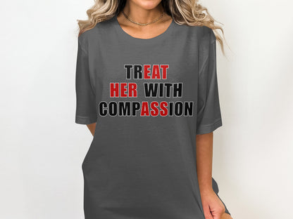 Gray t-shirt with text "TREAT HER WITH COMPASSION" in red and black.