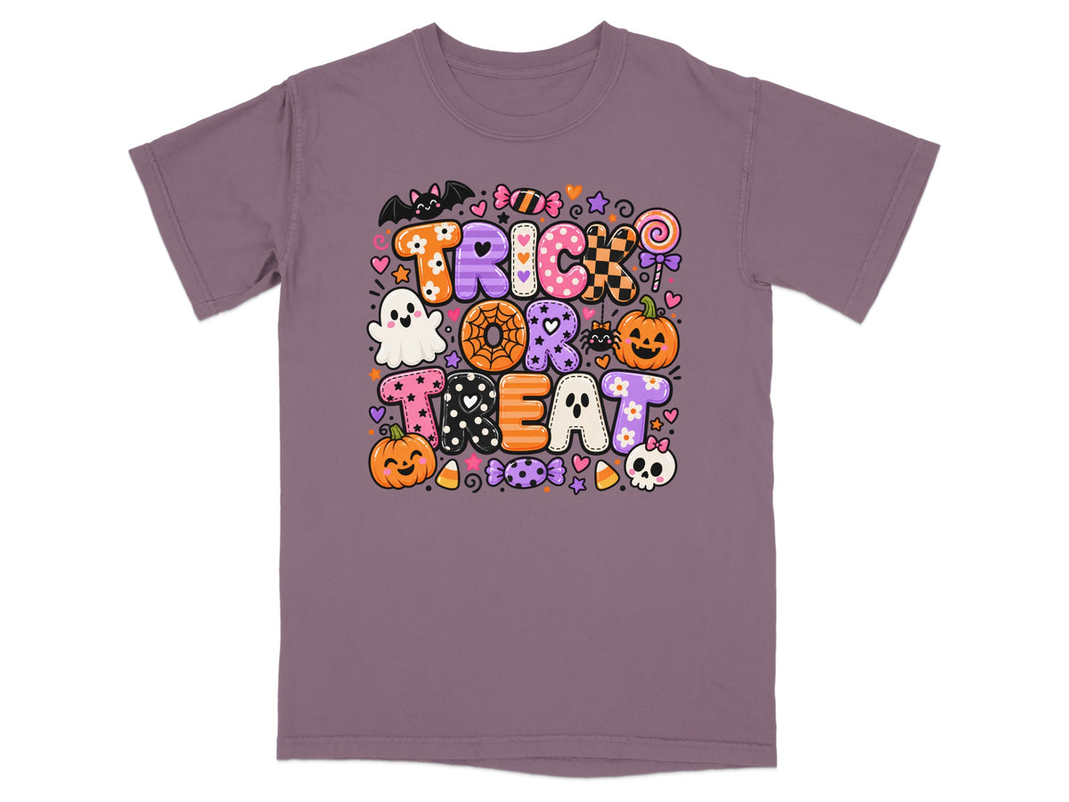 Purple t-shirt with "Trick or Treat" Halloween graphic featuring a ghost, pumpkin, and bat.