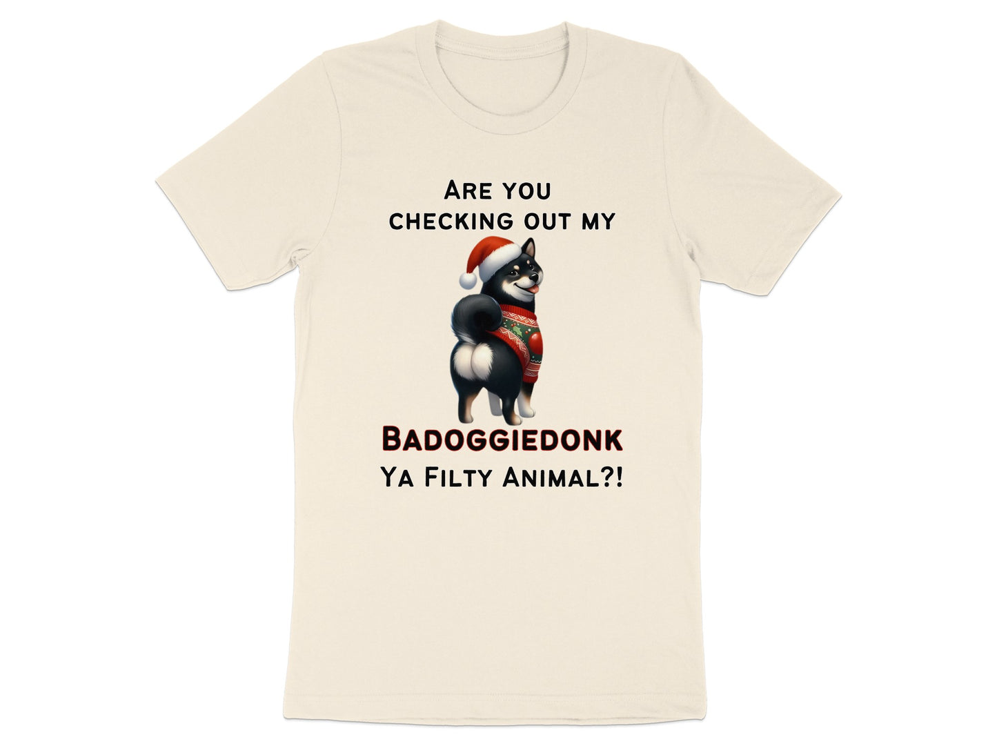 Cream t-shirt with text and a Shiba Inu wearing a Santa hat and sweater.