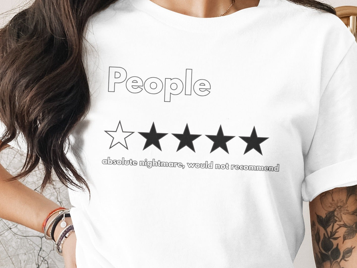 White t-shirt with "People" text and one star out of five.