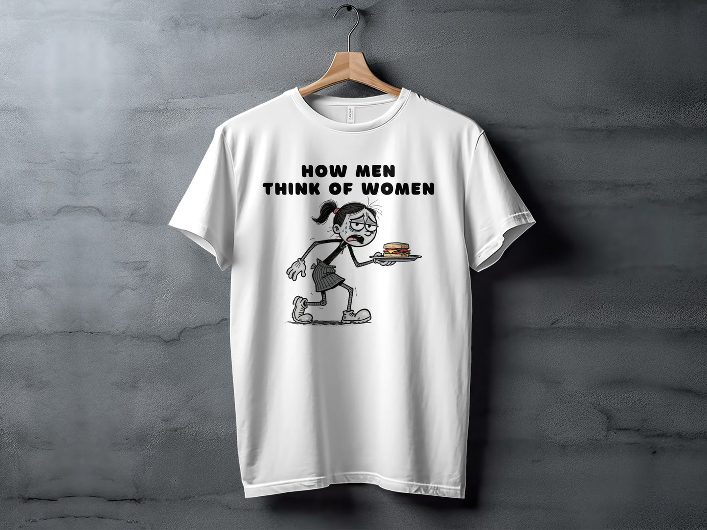 White t-shirt with text "HOW MEN THINK OF WOMEN" and cartoon of woman holding sandwich.