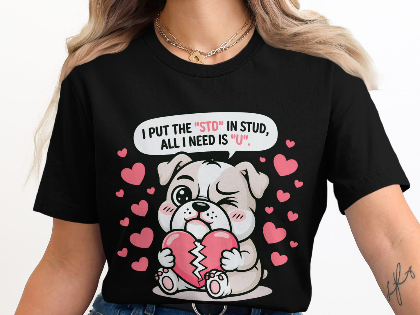Bulldog holding a broken heart, with text "I put the 'STD' in stud, all I need is 'U'".