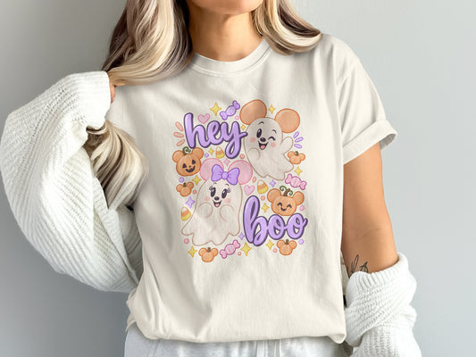 T-shirt graphic with "hey boo" text, ghosts, pumpkins, and candy.