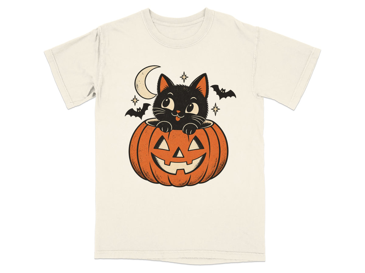 Black cat peeking out of a jack-o'-lantern with bats and a moon.