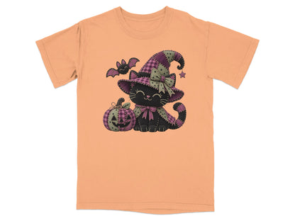 Orange t-shirt with a black cat wearing a patchwork witch hat and bow tie.