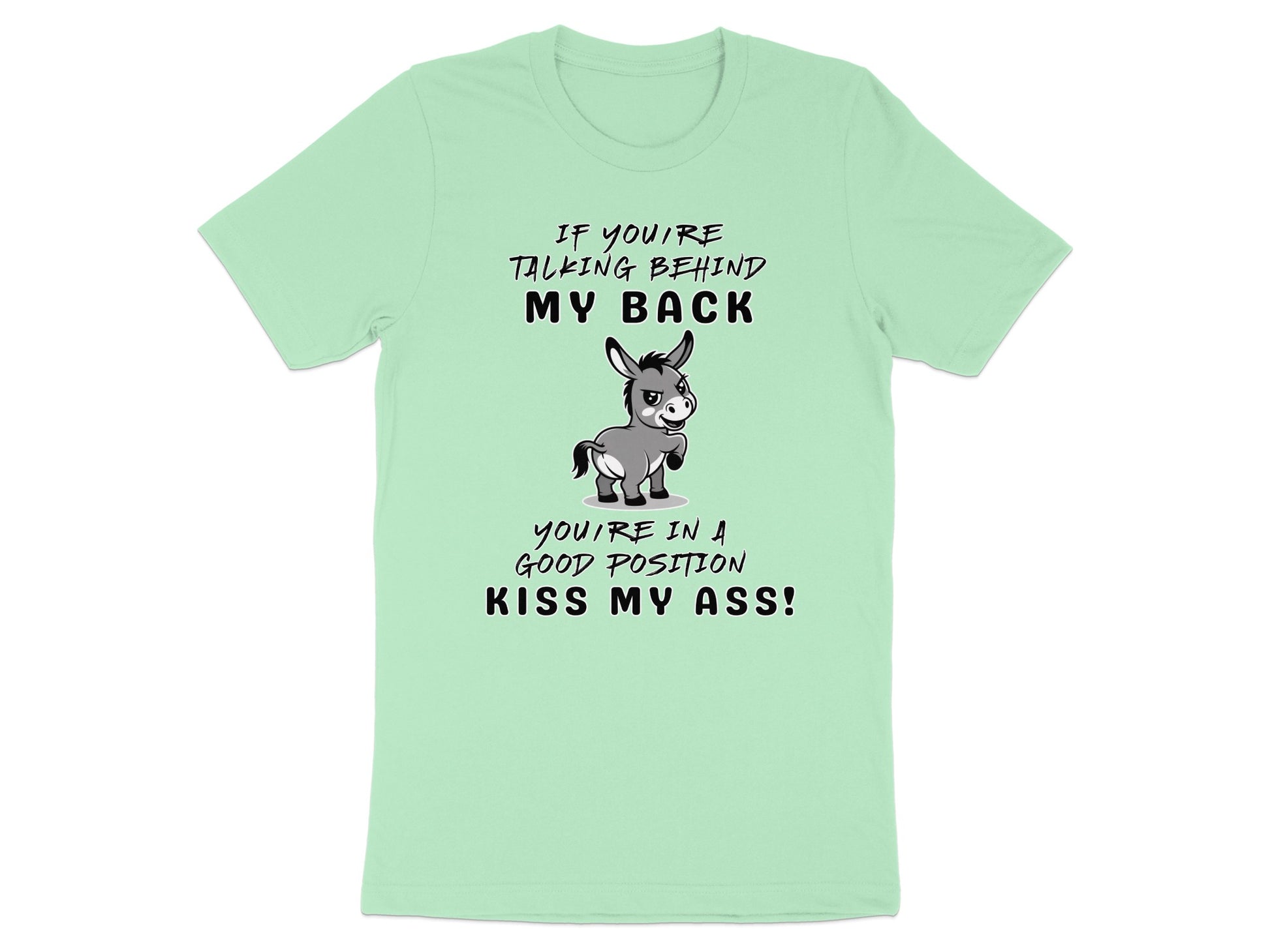 Light green t-shirt graphic with donkey and text "If you're talking behind my back you're in a good position kiss my ass!"