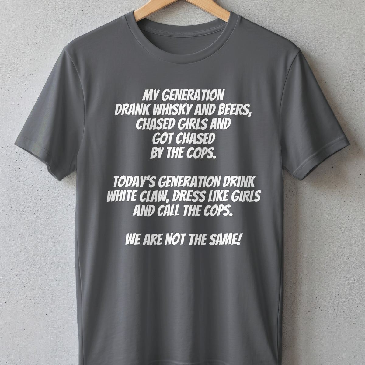 Grey t-shirt with white text comparing generations' habits.