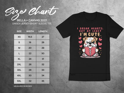 Black t-shirt with cartoon bulldog holding broken heart, "I Break Hearts, But At Least I'm Cute."