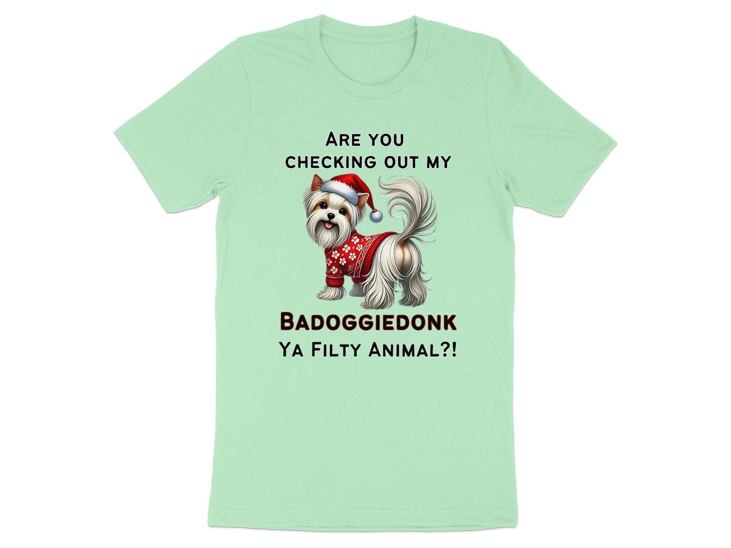 Light green t-shirt with a Yorkshire Terrier wearing a Santa hat and sweater. Text reads "ARE YOU CHECKING OUT MY BADOGGLEDONK YA FILTY ANIMAL?!".