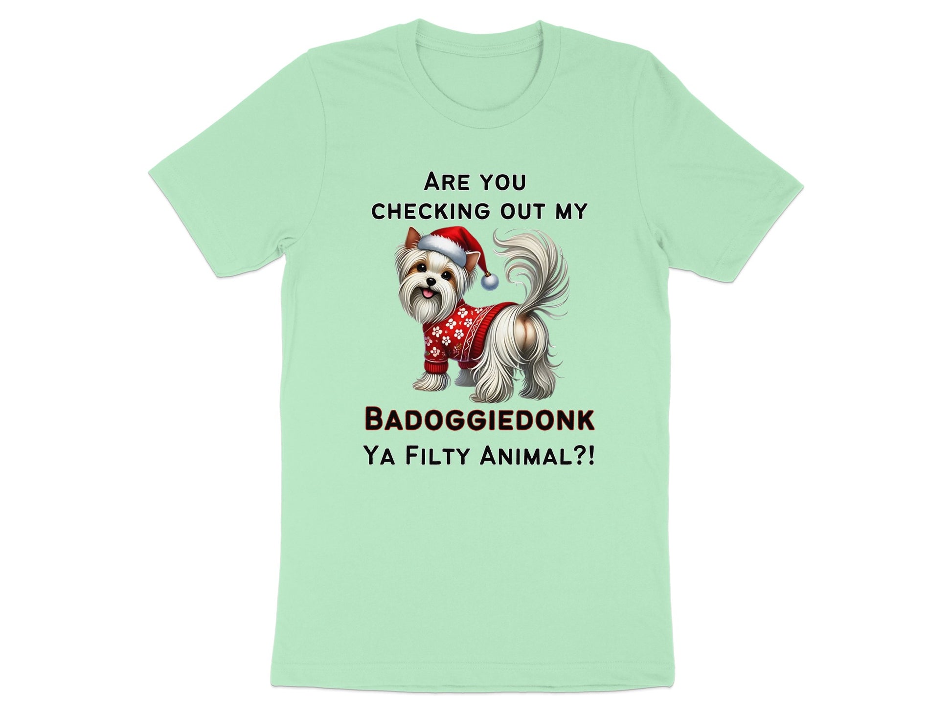 Light green t-shirt with a Yorkshire Terrier wearing a Santa hat and sweater. Text reads "ARE YOU CHECKING OUT MY BADOGGLEDONK YA FILTY ANIMAL?!".