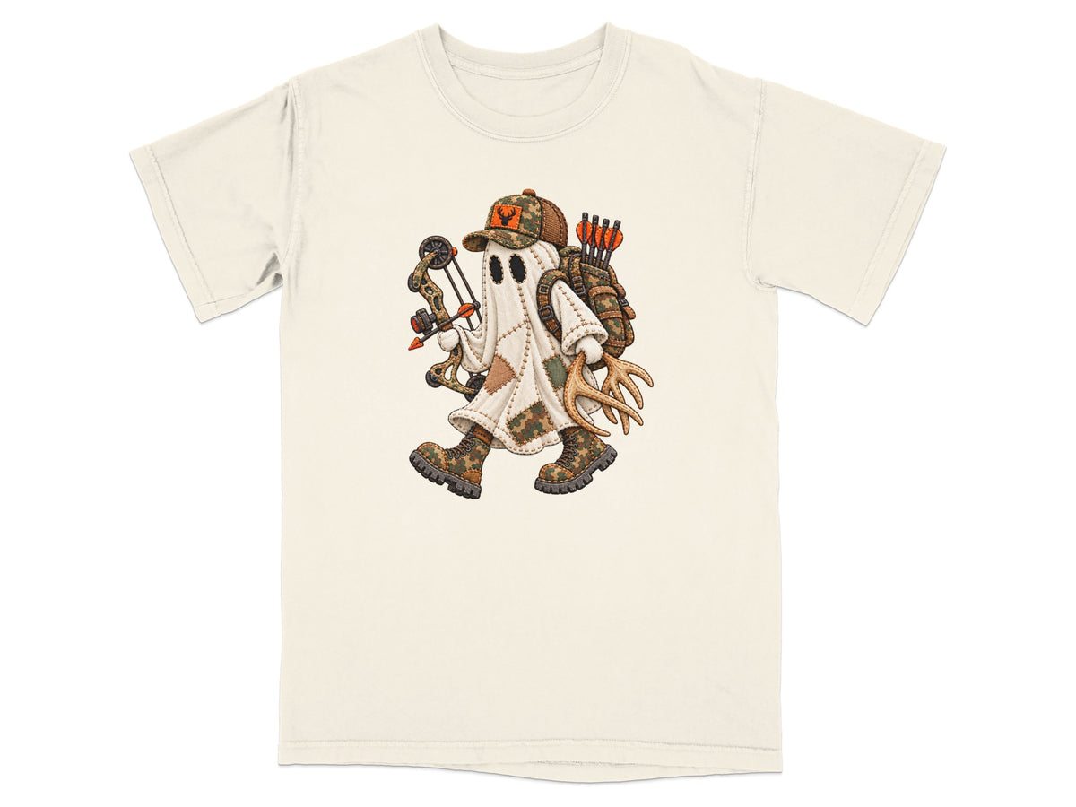 A cream-colored short-sleeved t-shirt features a cartoon graphic of a ghost dressed as a hunter holding a bow.
