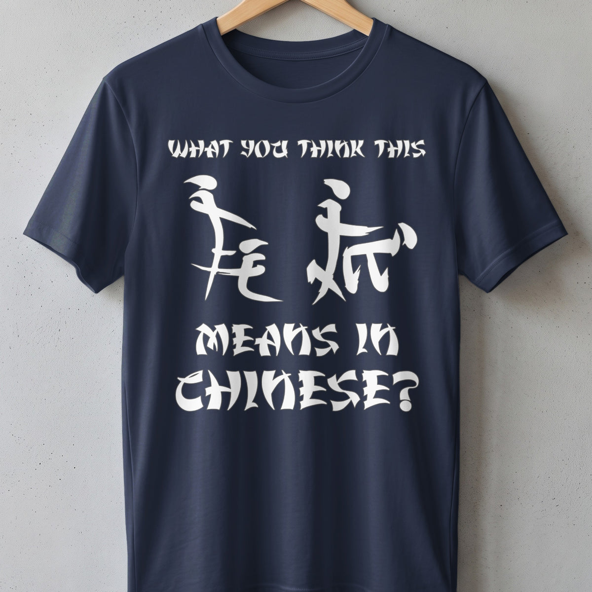 Dark blue t-shirt with white text: "What you think this means in Chinese?"