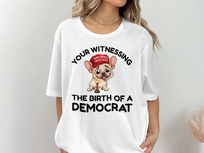 French bulldog wearing MAGA hat with text "YOUR WITNESSING THE BIRTH OF A DEMOCRAT".