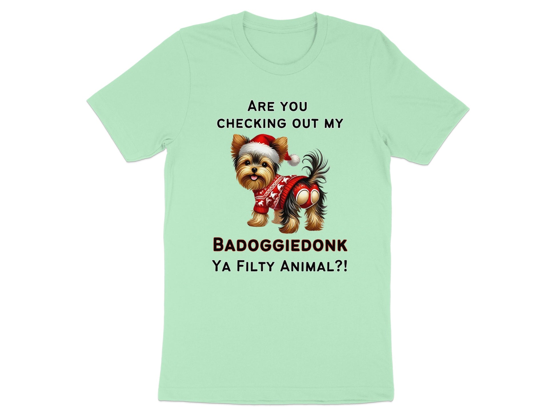 Yorkshire Terrier wearing a Santa hat and red sweater with text "Are you checking out my badoggiedonk ya filthy animal?!"