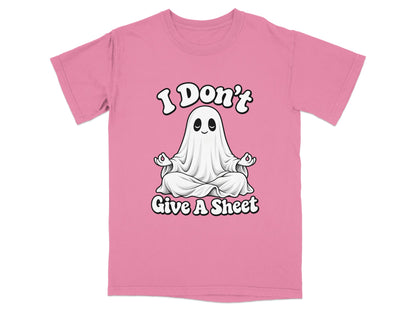 Pink t-shirt with a meditating ghost design and text "I Don't Give A Sheet".