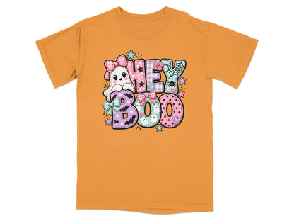 Orange t-shirt with "HEY BOO" text featuring a ghost, spiders, and stars.