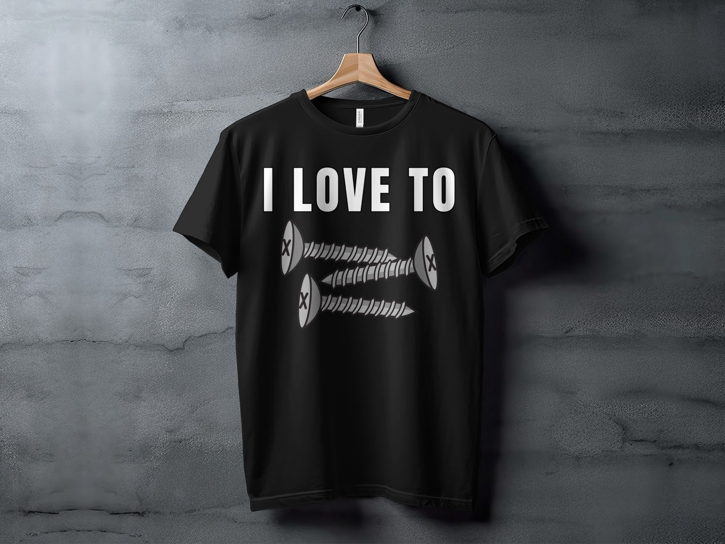 Black t-shirt with white text "I LOVE TO" and graphic of three screws.