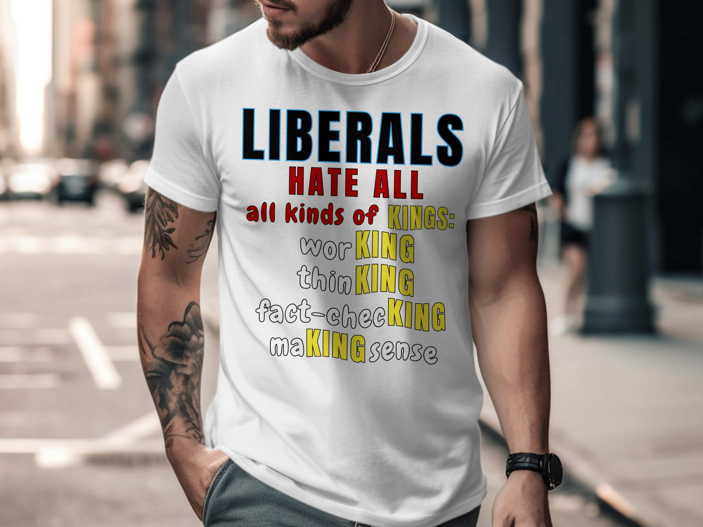 White t-shirt with "LIBERALS HATE ALL all kinds of KINGS: worKING thinKING fact-checking MAKING sense" printed on it.