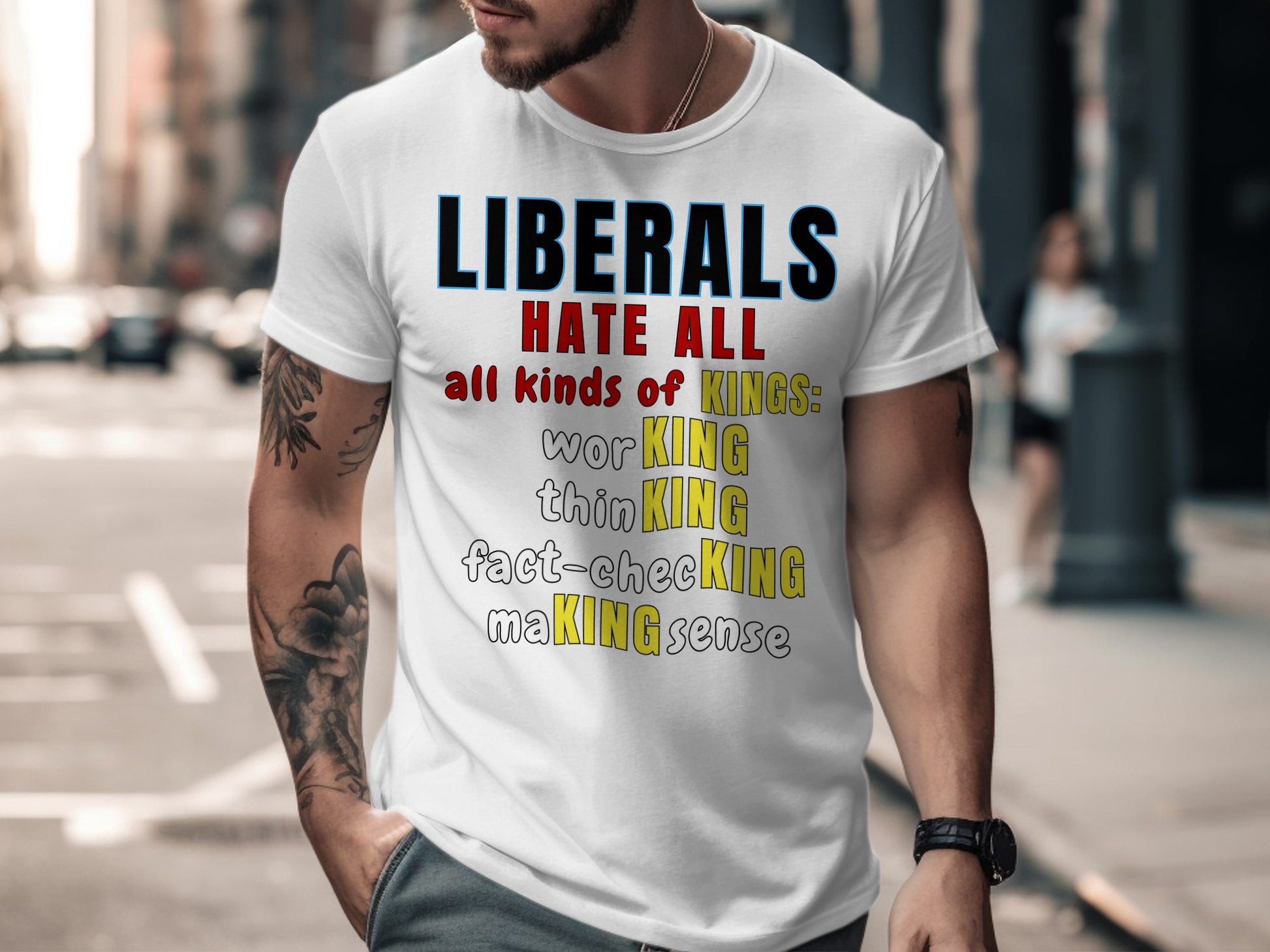 White t-shirt with "LIBERALS HATE ALL all kinds of KINGS: worKING thinKING fact-checking MAKING sense" printed on it.