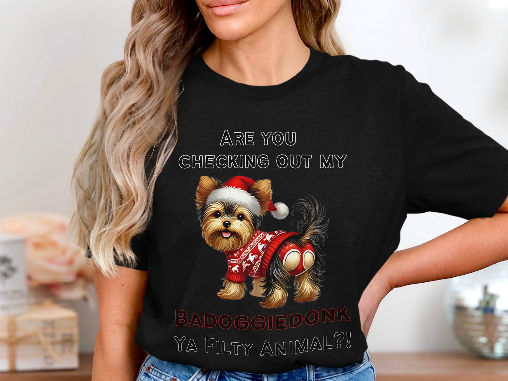 Yorkshire terrier wearing Santa hat and sweater with text "ARE YOU CHECKING OUT MY BADOGGIE DONK YA FILTY ANIMAL?!".