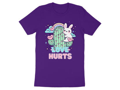 Purple t-shirt with kawaii cactus, bunny, hearts, clouds, rainbow, and stars graphic that says "LOVE HURTS".