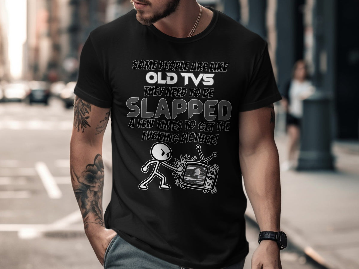 Black t-shirt with text about old TVs, a stick figure, and a television.