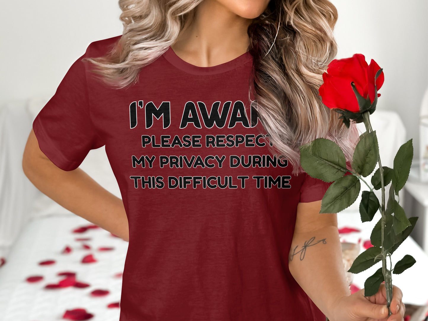 Maroon t-shirt with text "I'M AWARE PLEASE RESPECT MY PRIVACY DURING THIS DIFFICULT TIME."