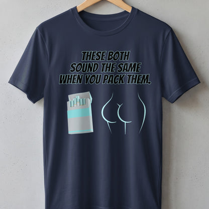 Navy t-shirt with text "These Both Sound The Same When You Pack Them" and graphics.