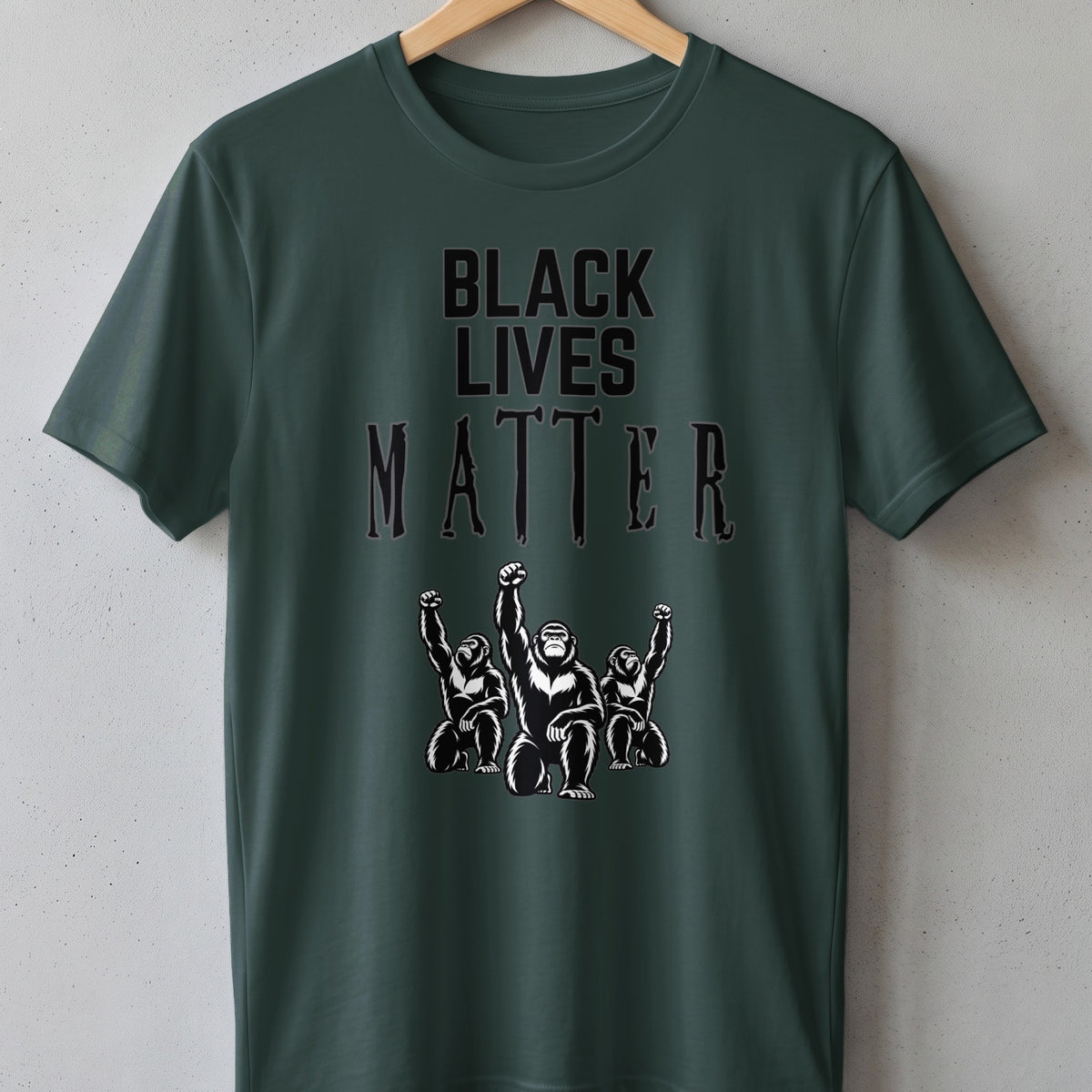 Green t-shirt with "BLACK LIVES MATTER" text and three gorillas with raised fists.