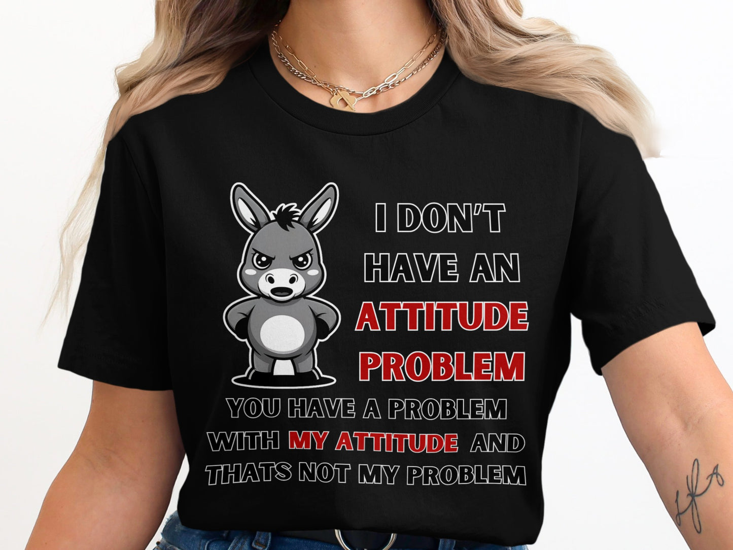 Black t-shirt with cartoon donkey and text "I don't have an attitude problem".