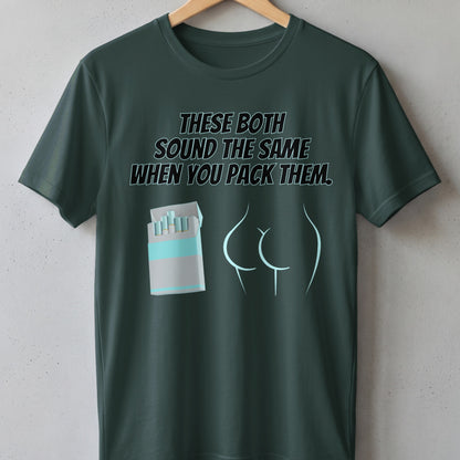 Dark green t-shirt with text "THESE BOTH SOUND THE SAME WHEN YOU PACK THEM."