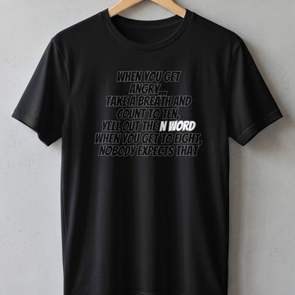 Black t-shirt with text: "When you get angry, take a breath and count to ten, yell out the n-word when you get to eight, nobody expects that."