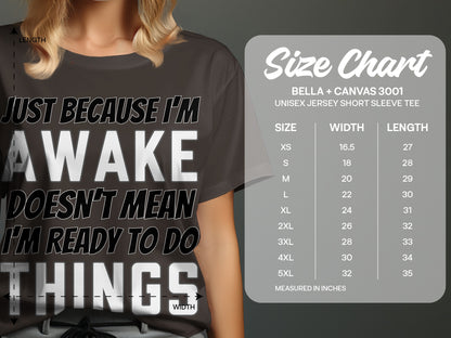 T-shirt with "Just Because I'm Awake Doesn't Mean I'm Ready To Do Things" and size chart.