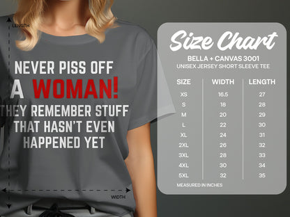 Grey t-shirt with text "Never piss off a woman! They remember stuff that hasn't even happened yet" and size chart.