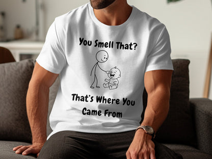 White t-shirt with black text and cartoon drawing: "You Smell That? That's Where You Came From".
