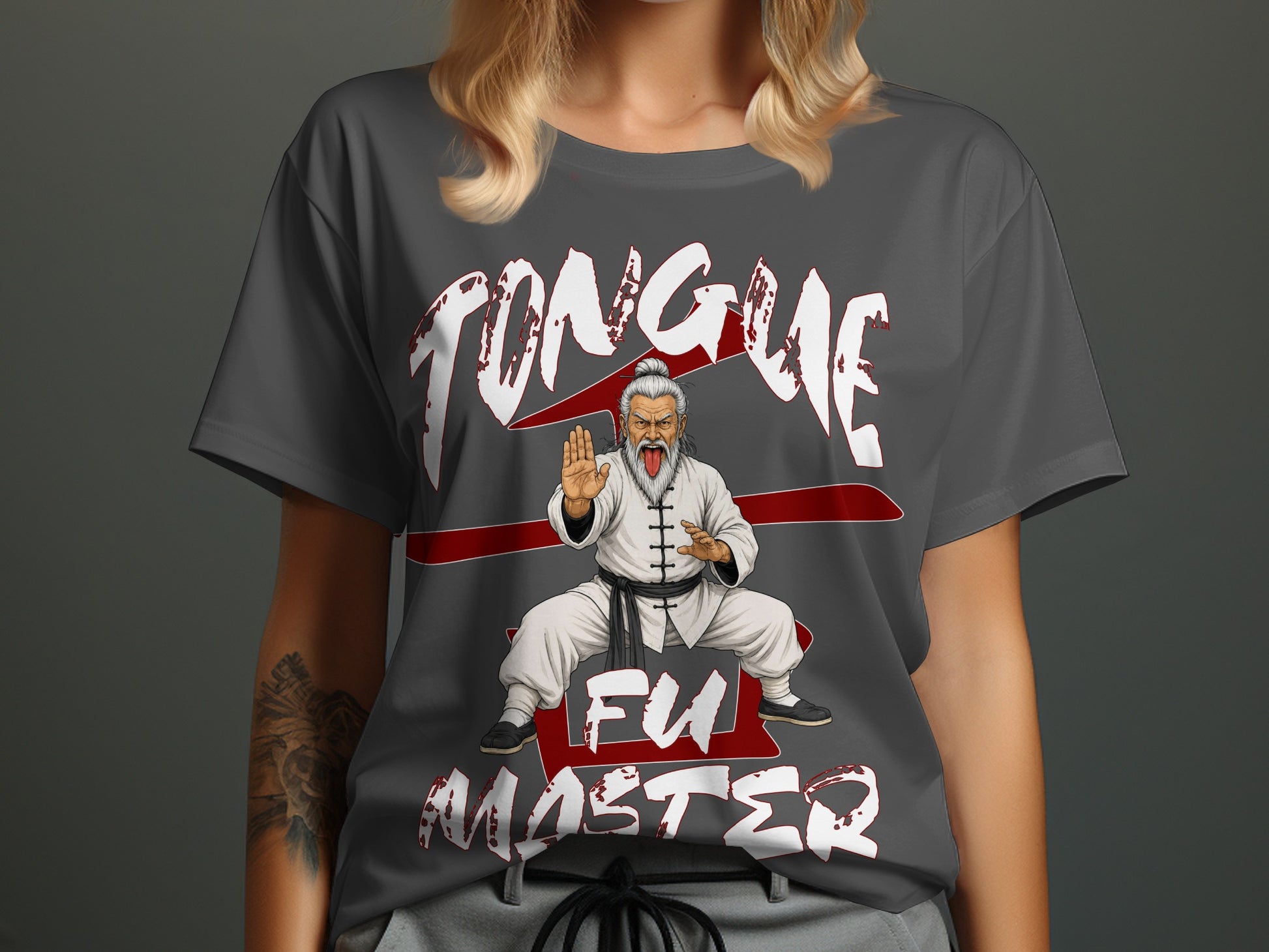 Grey t-shirt with white text "TONGUE FU MASTER" and a cartoon of a martial artist.