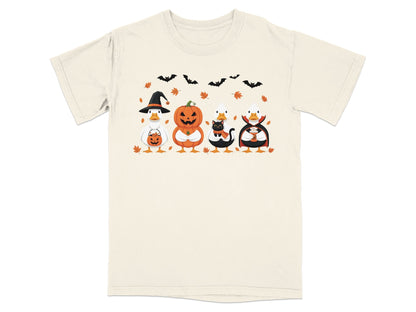 Four ducks in Halloween costumes: witch, pumpkin, cat, and vampire, with bats and leaves.