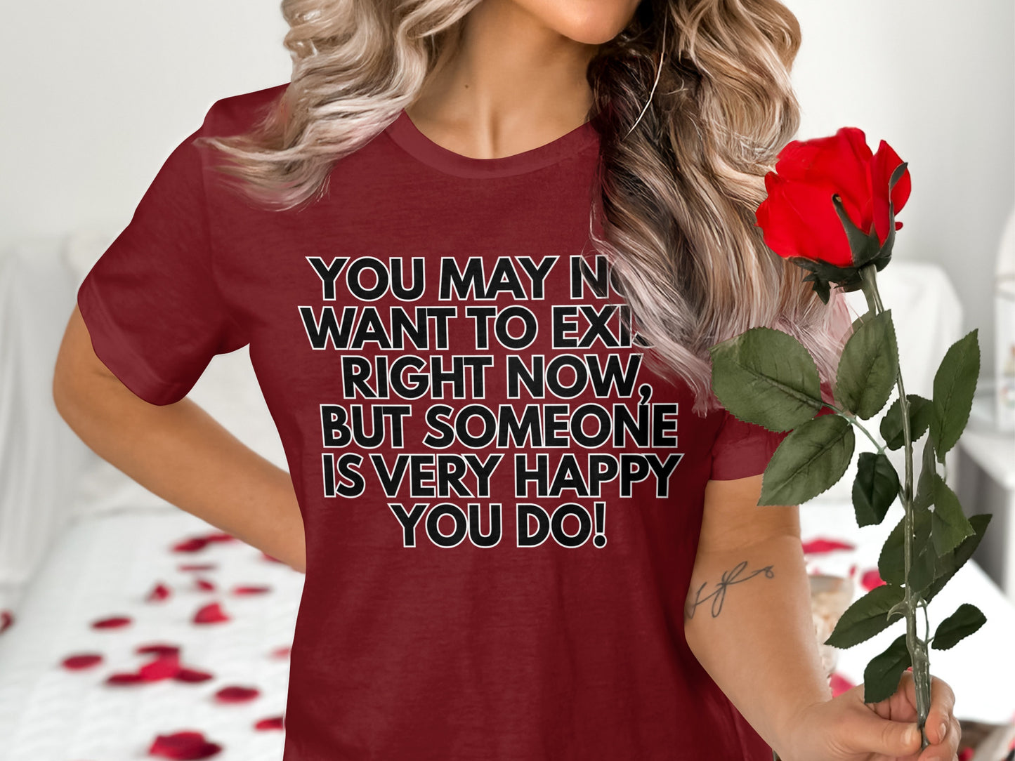 Maroon t-shirt with white text: "YOU MAY NOT WANT TO EXIT RIGHT NOW, BUT SOMEONE IS VERY HAPPY YOU DO!"